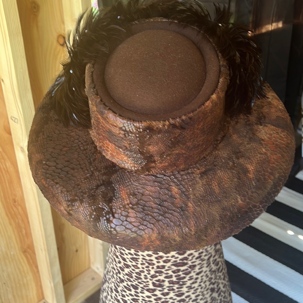 Ladies dark brown animal print hat with black feather